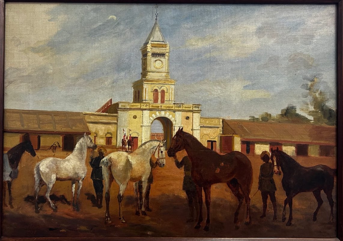 Mysore Stables
Oil on Canvas, 1904
Raja Ravi Varma (1848–1906)

Amidst Raja Ravi Varma’s celebrated mythological and royal portraits, Mysore Stables (1904) offers a rare and compelling glimpse into colonial India’s equestrian culture. Set against the architectural backdrop of