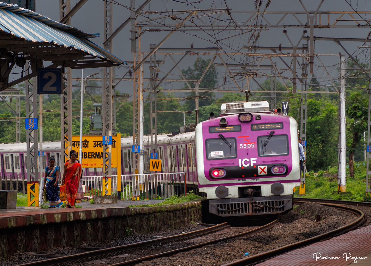 With dark monsoon clouds approaching Kasara hills, Central Railway’s 12 coach pink face Alstom EMU 5505-5508 (248327-28) heading towards Khardi Railway Station