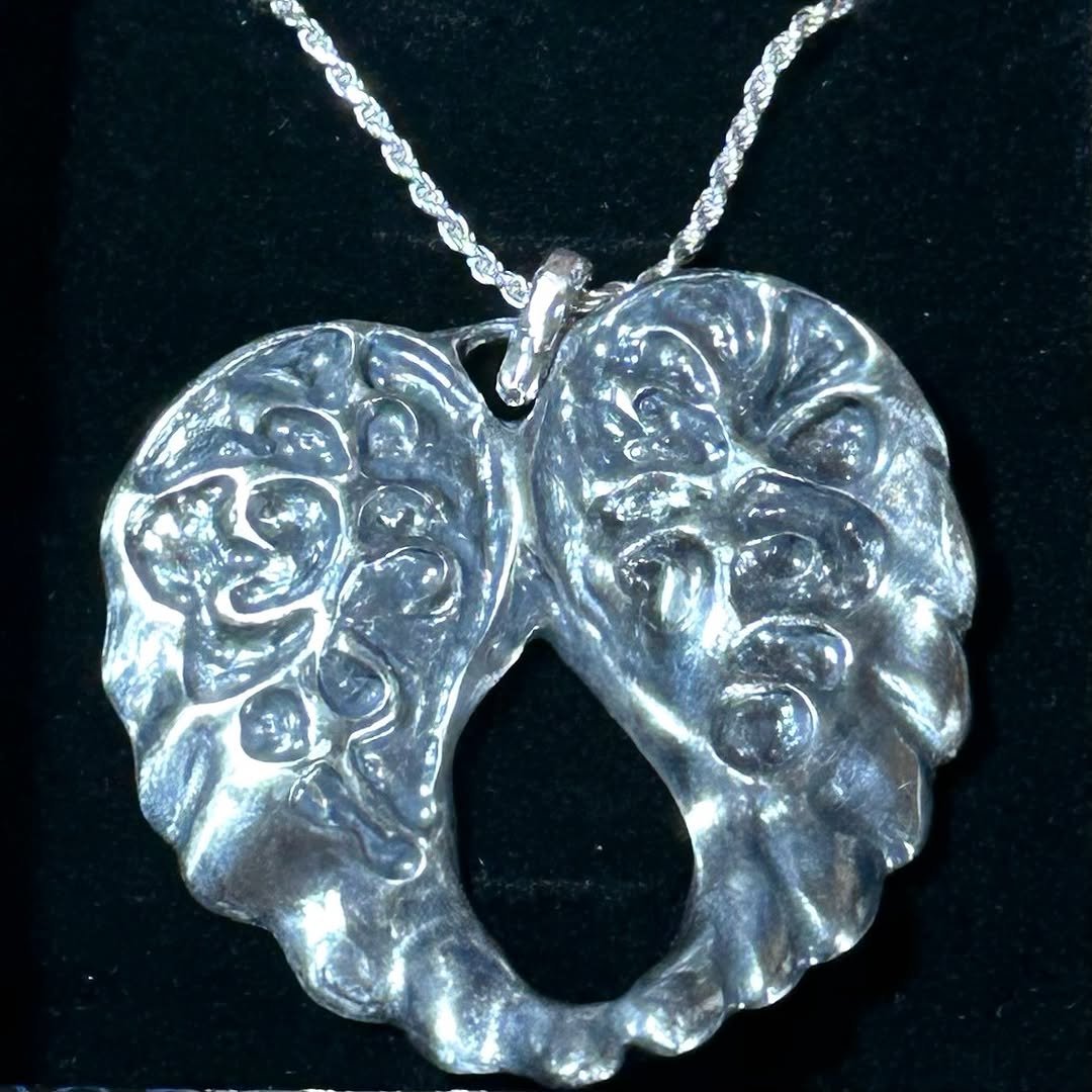 oh the same brand that made his custom wings necklace