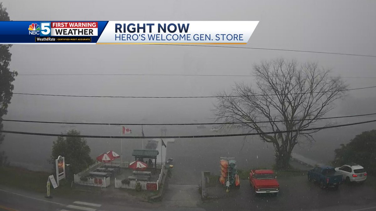 Just DUMPING rain and small hail in North Hero... people taking shelter near the picnic tables!