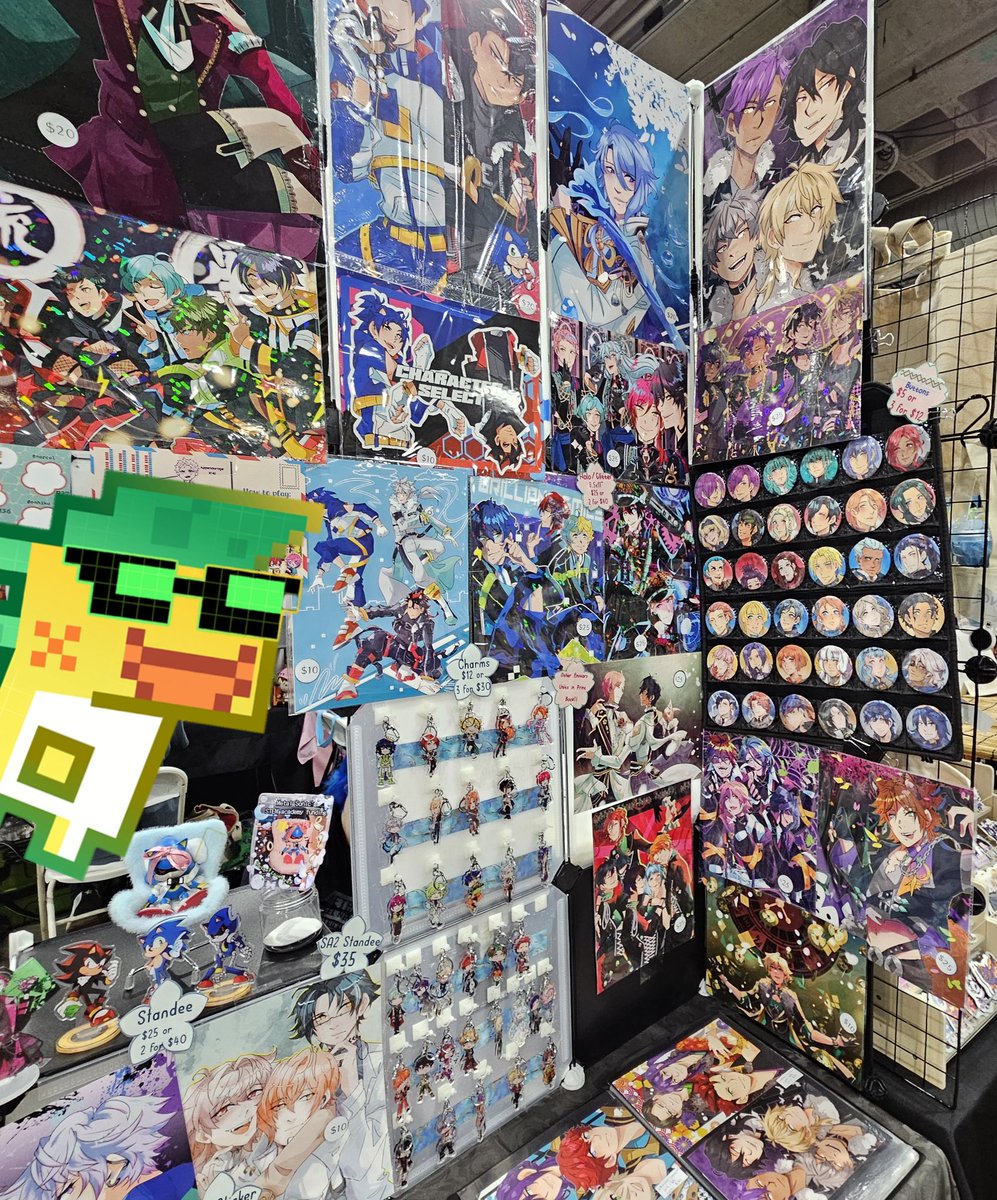 appendorange's tweet photo. All set up at #AX2025!! Catch me in the AA at K48 with new enstars and more!

Also come see my actual robot son at his first convention 🥺 https://t.co/JSkHfZwrNP