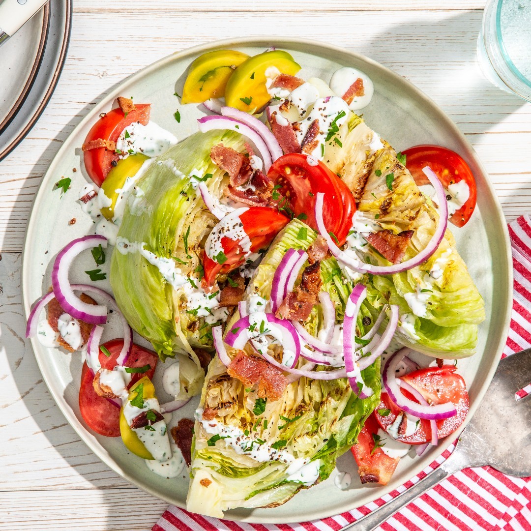 We love to fill summer time with crisp salads 🙌 this Grilled BLT Wedge will be on repeat all season long using our Iceberg Lettuce and Tanimura &amp; Antle Artisan Sweet Italian Red Onions!
Get the recipe here👉 bit.ly/3HOcG89

#taproduce #recipe #summer #salad #farmtotable