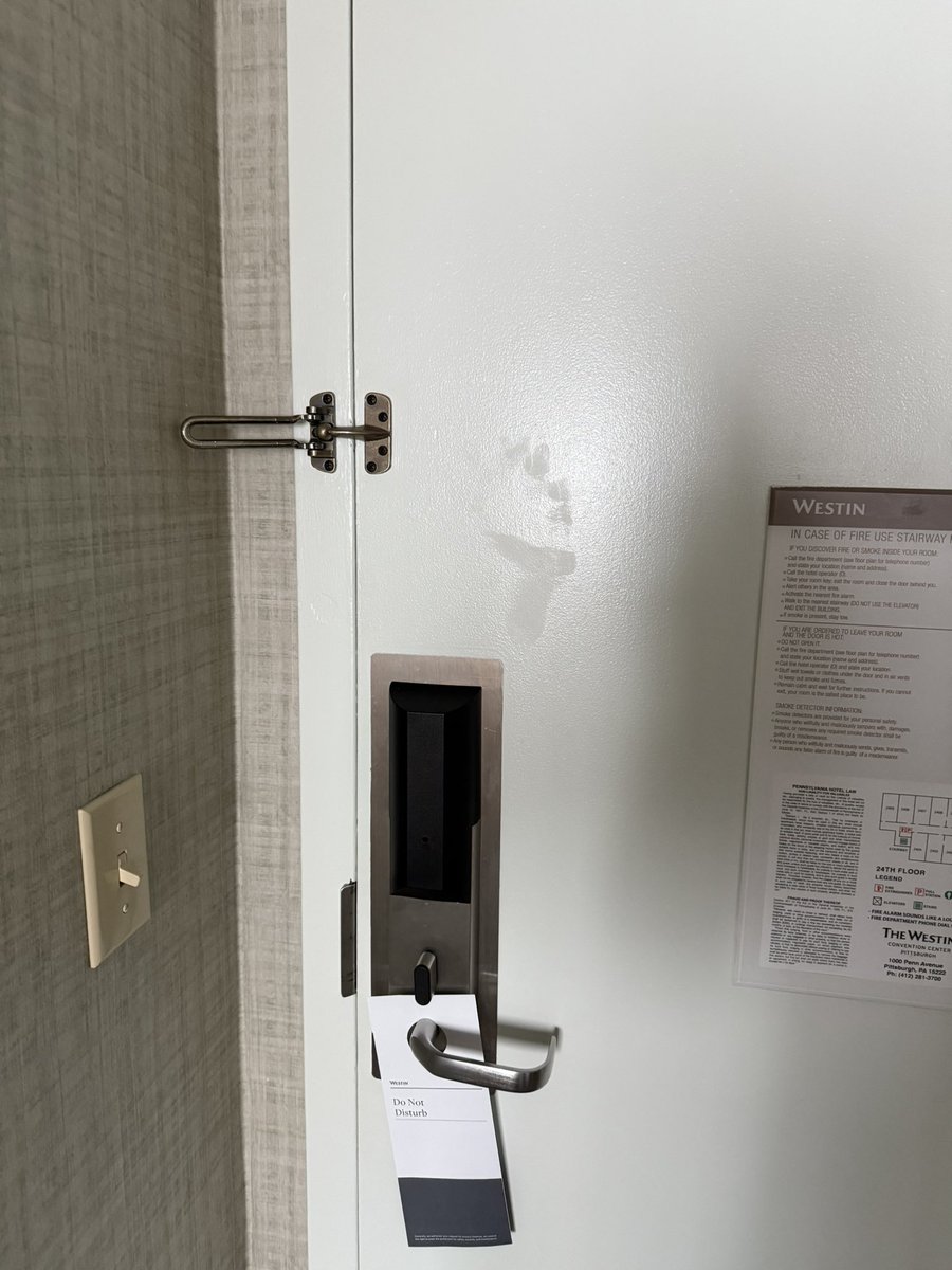 TuckerBees's tweet image. There’s a mysterious foot print(?) on our room door and I’m cracking up