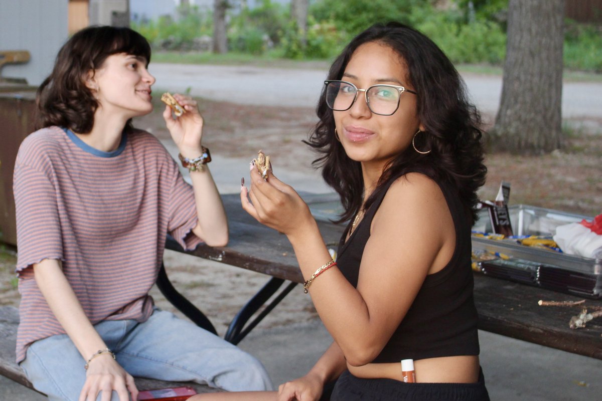 UMBS's tweet image. At the end of move-in day on July 1 for students taking courses in the summer term, the @UMBS community celebrated with s’mores along Douglas Lake.