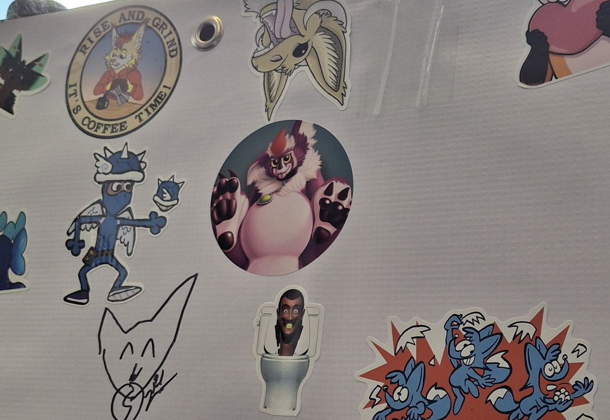 Looked for an open spot to leave a sticker. Slapped it on there and realized I put it right next to a skibity toilet. #AC2025 #anthrocon2025