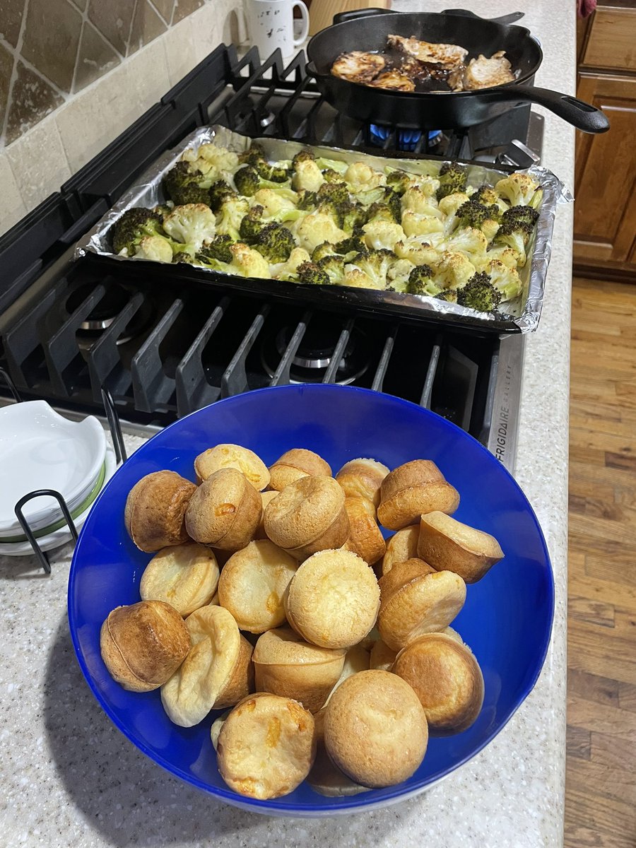 Making Brazilian cheese bread, roasted broccoli and cauliflower, and pork chops while my man shovels gravel. Hoping he’ll take a break for dinner 🪏