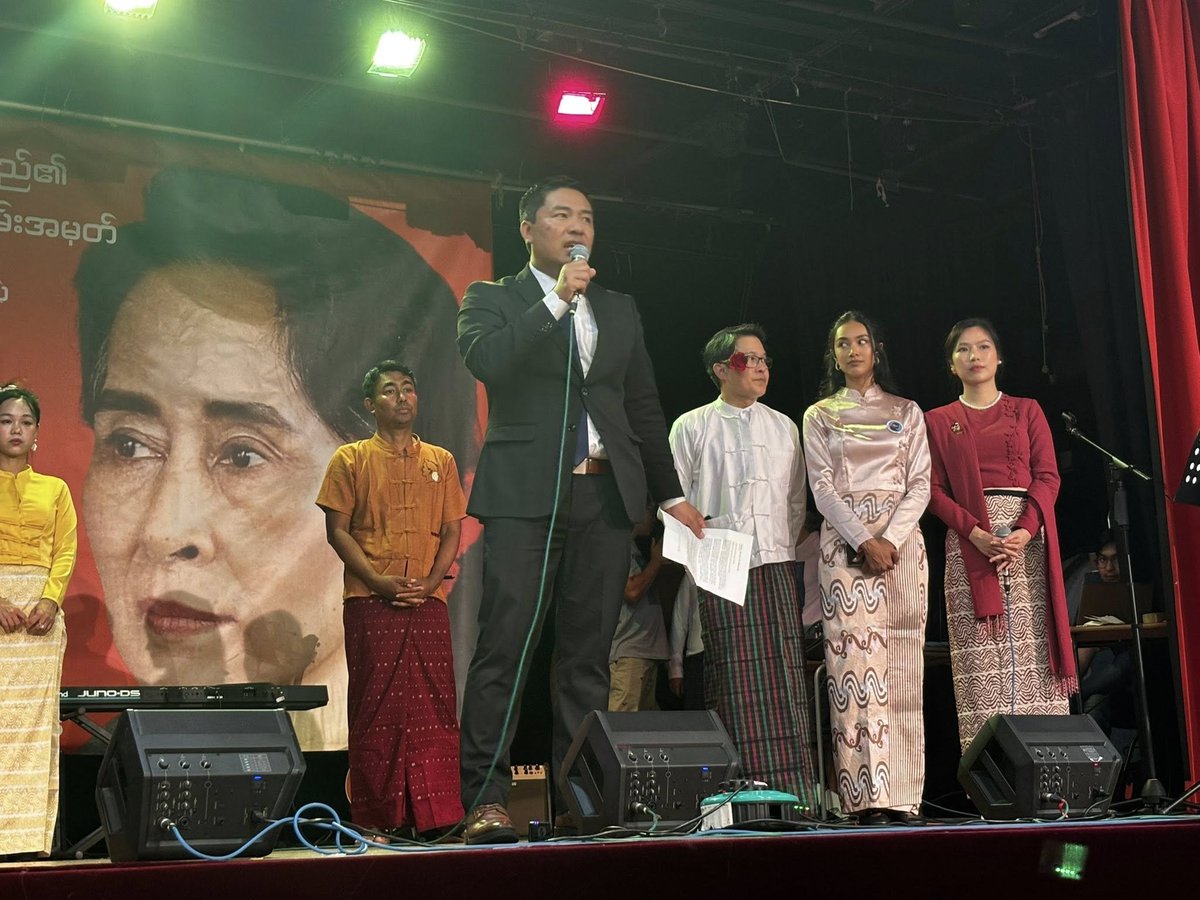 DrSasa22222's tweet photo. Tribute to Amay Suu (Mother Suu), Burma’s State Counsellor Daw Aung San Suu Kyi, on Her 80th Birthday
By Dr. Sasa
Thank you for the honor of joining you here in London. If we were to commemorate Amay Suu, Mother Suu’s, birthday in Burma, we would be arrested by the brutal military junta, perhaps even executed. But here, in this land of liberty and freedom, we are able to honor her life, her leadership, and her legacy. And so, it is with both joy and deep sorrow that we mark the 80th birthday of our beloved Mother Suu, Daw Aung San Suu Kyi.
This is not a celebration in her presence, but in her absence. For the fourth consecutive year, we honor her birthday while she remains unjustly imprisoned by the brutal military junta, the SAC. These four years have been filled with unimaginable pain, grief, and injustice. We have received troubling reports that she was injured during recent earthquakes in Burma, and we are anguished to know that she is being denied even the most basic health care and human rights.
As the United Kingdom and the international community have stood firmly with the people of Ukraine, I pray that the time has now come to stand with the brave people of Burma. The time has come to demand the immediate and unconditional release of Daw Aung San Suu Kyi, President U Win Myint, and the more than 22,000 political prisoners who remain unlawfully detained under the military’s reign of terror.
Let the world hear this clearly: although the military junta has taken away Daw Aung San Suu Kyi’s physical freedom, they will never extinguish her love for Burma nor the people’s love for her. They may try to silence her voice, but they cannot silence the nearly 60 million people she has inspired. We are her sons and daughters, we are the children of Burma shaped by her courage, guided by her vision, and united by our shared determination to end this brutal military regime once and for all, and to build a new Burma founded on federal democratic values and principles that can never be compromised.
Even behind prison walls, Mother Suu remains a beacon of resilience. Her courage is unbroken. Her spirit is undiminished. Her love for the people burns brighter than ever before. She taught us to hope when hope seemed lost. She led not only through her words but through her life with dignity, with sacrifice, and with unyielding conviction in a future where every person, regardless of ethnicity, religion, or background, can live in freedom, dignity, and peace.
That is the new Burma, the federal democratic Burma for which she has suffered, sacrifice, and to which she has devoted her life. And that is the Burma we are now called to build.
The greatest gift we can offer Daw Aung San Suu Kyi today is not words or ceremonies, but decisive action. Let us renew our collective commitment to secure the immediate and unconditional release of Daw Aung San Suu Kyi, President U Win Myint and all political prisoners, and to bring an end once and for all to military dictatorship in Burma, and to build a new Burma founded on federal democratic values and principles. 
Let us build a new nation founded on justice, unity, peace, equality, and prosperity for all.
To the international community: please, do not honor her legacy with words alone. Honor it with action. Apply meaningful and coordinated pressure on the military junta through what we call the three cuts:
• Cut off weapons and jet fuel.
• Cut off all legitimacy and reject the junta’s plan for a sham election by the end of this year,2025.
• Cut off access to international finance and banking systems.
Support the people of Burma in their struggle. This is not only a call for justice—it is a call for humanity.
Today, as we mark Mother Suu’s 80th birthday, we do so with sorrow, but also with profound pride. We honor her sacrifice, her strength, and her unwavering love. And we make her this solemn promise: we will not stop.
We will not give up.
We will not rest until all forms of dictatorship are defeated and a free, federal democratic Burma is realized.
A Burma where all armed forces are under civilian supremacy.
A Burma where transitional justice is delivered.
A Burma where our social economy once again becomes the breadbasket of Asia.
A Burma where federal democratic governance is built from the smallest village to the largest city, from local governance to a strong and united federal union.
A Burma that becomes a stabilizing force in Asia, strategically located at the crossroads of India and China, South and Southeast Asia advancing peace, security, and prosperity across the Indo-Pacific, Indian Ocean and the wider world.
Happy 80th Birthday, Amay Suu—Mother Suu.
May you be safe.
May you be strong.
May you live to see the dawn of the new Burma, the federal democratic nation you gave your life to build.
Thank you.