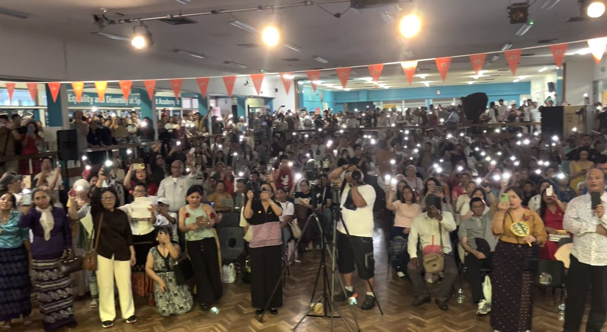 DrSasa22222's tweet photo. Tribute to Amay Suu (Mother Suu), Burma’s State Counsellor Daw Aung San Suu Kyi, on Her 80th Birthday
By Dr. Sasa
Thank you for the honor of joining you here in London. If we were to commemorate Amay Suu, Mother Suu’s, birthday in Burma, we would be arrested by the brutal military junta, perhaps even executed. But here, in this land of liberty and freedom, we are able to honor her life, her leadership, and her legacy. And so, it is with both joy and deep sorrow that we mark the 80th birthday of our beloved Mother Suu, Daw Aung San Suu Kyi.
This is not a celebration in her presence, but in her absence. For the fourth consecutive year, we honor her birthday while she remains unjustly imprisoned by the brutal military junta, the SAC. These four years have been filled with unimaginable pain, grief, and injustice. We have received troubling reports that she was injured during recent earthquakes in Burma, and we are anguished to know that she is being denied even the most basic health care and human rights.
As the United Kingdom and the international community have stood firmly with the people of Ukraine, I pray that the time has now come to stand with the brave people of Burma. The time has come to demand the immediate and unconditional release of Daw Aung San Suu Kyi, President U Win Myint, and the more than 22,000 political prisoners who remain unlawfully detained under the military’s reign of terror.
Let the world hear this clearly: although the military junta has taken away Daw Aung San Suu Kyi’s physical freedom, they will never extinguish her love for Burma nor the people’s love for her. They may try to silence her voice, but they cannot silence the nearly 60 million people she has inspired. We are her sons and daughters, we are the children of Burma shaped by her courage, guided by her vision, and united by our shared determination to end this brutal military regime once and for all, and to build a new Burma founded on federal democratic values and principles that can never be compromised.
Even behind prison walls, Mother Suu remains a beacon of resilience. Her courage is unbroken. Her spirit is undiminished. Her love for the people burns brighter than ever before. She taught us to hope when hope seemed lost. She led not only through her words but through her life with dignity, with sacrifice, and with unyielding conviction in a future where every person, regardless of ethnicity, religion, or background, can live in freedom, dignity, and peace.
That is the new Burma, the federal democratic Burma for which she has suffered, sacrifice, and to which she has devoted her life. And that is the Burma we are now called to build.
The greatest gift we can offer Daw Aung San Suu Kyi today is not words or ceremonies, but decisive action. Let us renew our collective commitment to secure the immediate and unconditional release of Daw Aung San Suu Kyi, President U Win Myint and all political prisoners, and to bring an end once and for all to military dictatorship in Burma, and to build a new Burma founded on federal democratic values and principles. 
Let us build a new nation founded on justice, unity, peace, equality, and prosperity for all.
To the international community: please, do not honor her legacy with words alone. Honor it with action. Apply meaningful and coordinated pressure on the military junta through what we call the three cuts:
• Cut off weapons and jet fuel.
• Cut off all legitimacy and reject the junta’s plan for a sham election by the end of this year,2025.
• Cut off access to international finance and banking systems.
Support the people of Burma in their struggle. This is not only a call for justice—it is a call for humanity.
Today, as we mark Mother Suu’s 80th birthday, we do so with sorrow, but also with profound pride. We honor her sacrifice, her strength, and her unwavering love. And we make her this solemn promise: we will not stop.
We will not give up.
We will not rest until all forms of dictatorship are defeated and a free, federal democratic Burma is realized.
A Burma where all armed forces are under civilian supremacy.
A Burma where transitional justice is delivered.
A Burma where our social economy once again becomes the breadbasket of Asia.
A Burma where federal democratic governance is built from the smallest village to the largest city, from local governance to a strong and united federal union.
A Burma that becomes a stabilizing force in Asia, strategically located at the crossroads of India and China, South and Southeast Asia advancing peace, security, and prosperity across the Indo-Pacific, Indian Ocean and the wider world.
Happy 80th Birthday, Amay Suu—Mother Suu.
May you be safe.
May you be strong.
May you live to see the dawn of the new Burma, the federal democratic nation you gave your life to build.
Thank you.