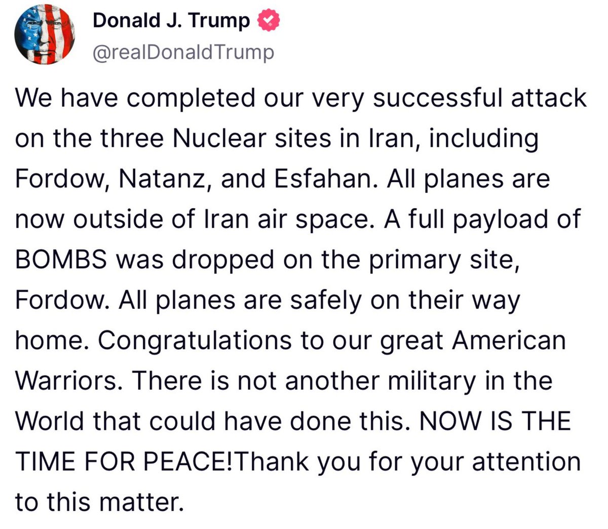 "Now is the time for peace," he says, as bombs drop.