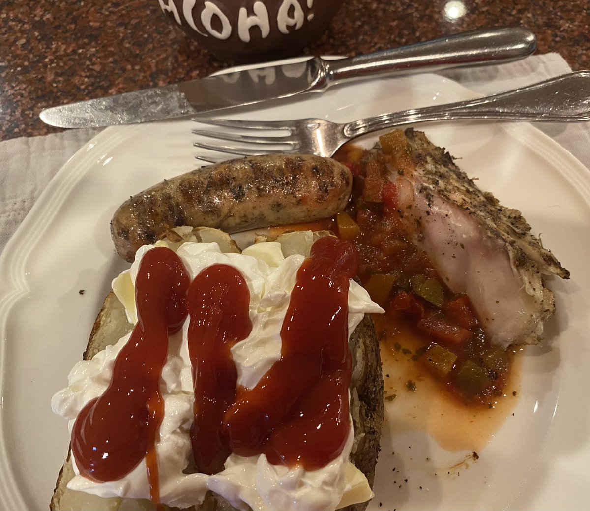 Fresh caught Striper. Local Chicken Sausages &amp; Baked Potatoes.
Yes, I like my baked potato with butter, sour cream (Breakstone’s) and ketchup. Thea Singer is visiting a dear friend.