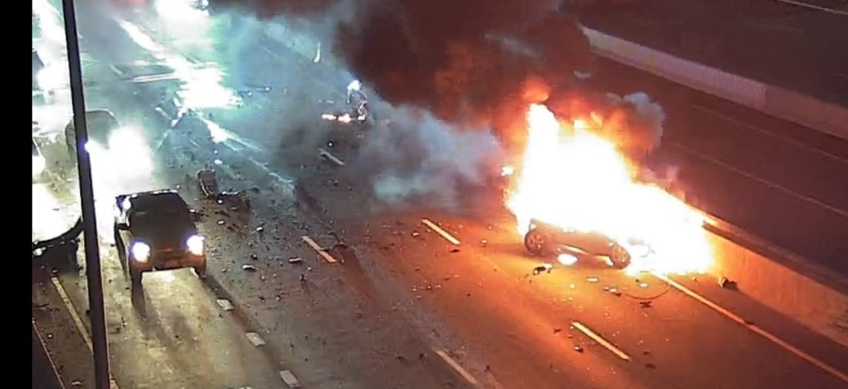 pauls612's tweet photo. Providence I-95 near the mall mva with a fully involved car. Companies responding. Screengrab from @RIDOTNews traffic cam https://t.co/GM1UleJP6G