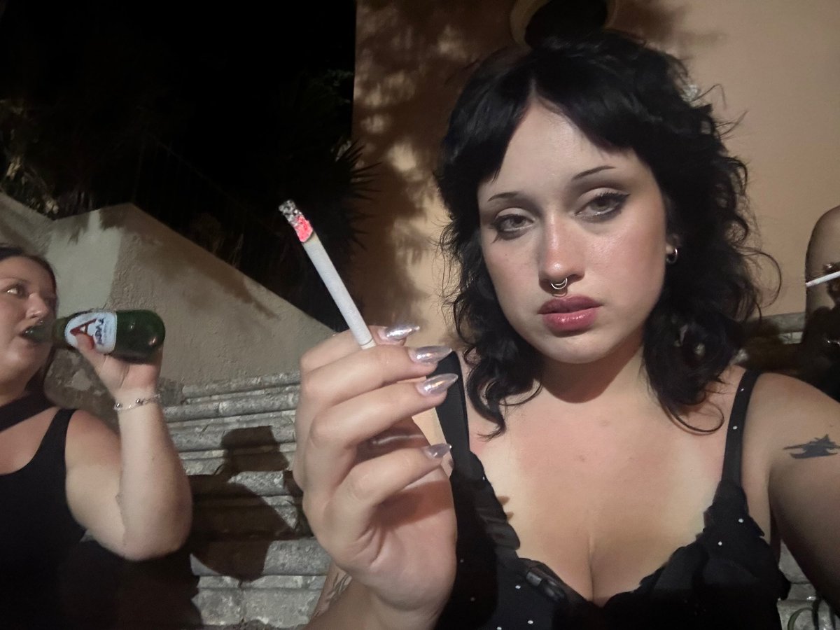 nictariine's tweet photo. here’s me drunk outside a church in corfu https://t.co/dunA89s7uA
