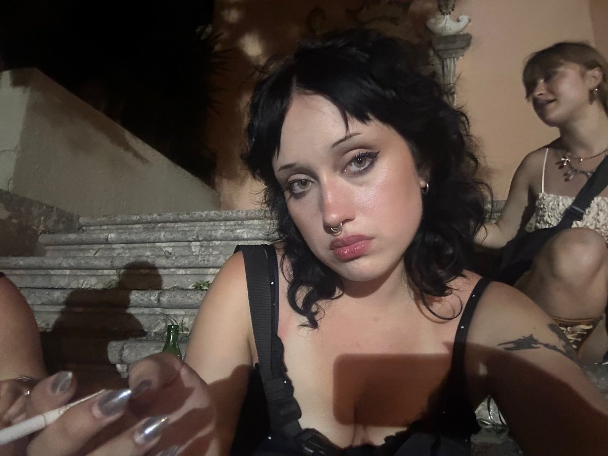 here’s me drunk outside a church in corfu