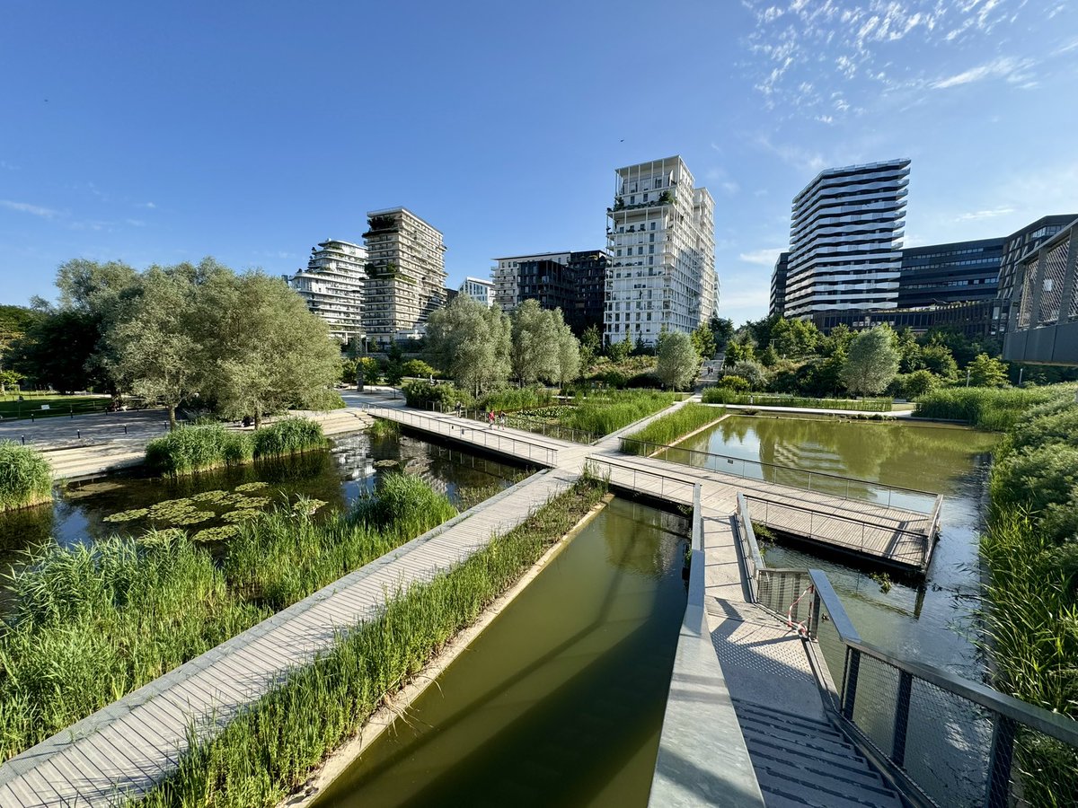 BrentToderian's tweet photo. NEW PARIS CENTRE: This is VERY good. Clichy-Batignolles (former rail yard lands), one of many transformations/new centres at Paris Metro transit stations planning or being built around the city. Dense, mixed (with an urban IKEA, grocery store, shops, services, community facilities, schools, jobs etc), diverse (50% public housing, 20% middle class rental, 30% market ownership), architecturally interesting, strong public realm and ground floor design, 1/3rd of the land dedicated to beautiful central linear park (Martin Luther King Park). Home to 20k more people already.

Kudos to all involved and thanks again for the tour and deep conversation, @CarlosMorenoFr!