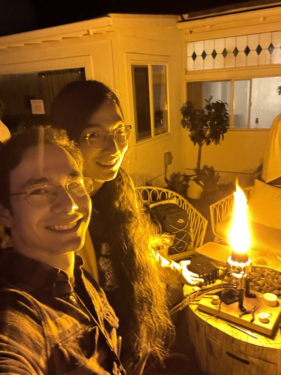 someone sent me this shot of me and the <a href="/lightcellenergy/">lightcell energy 🔆</a> at lighthaven :)