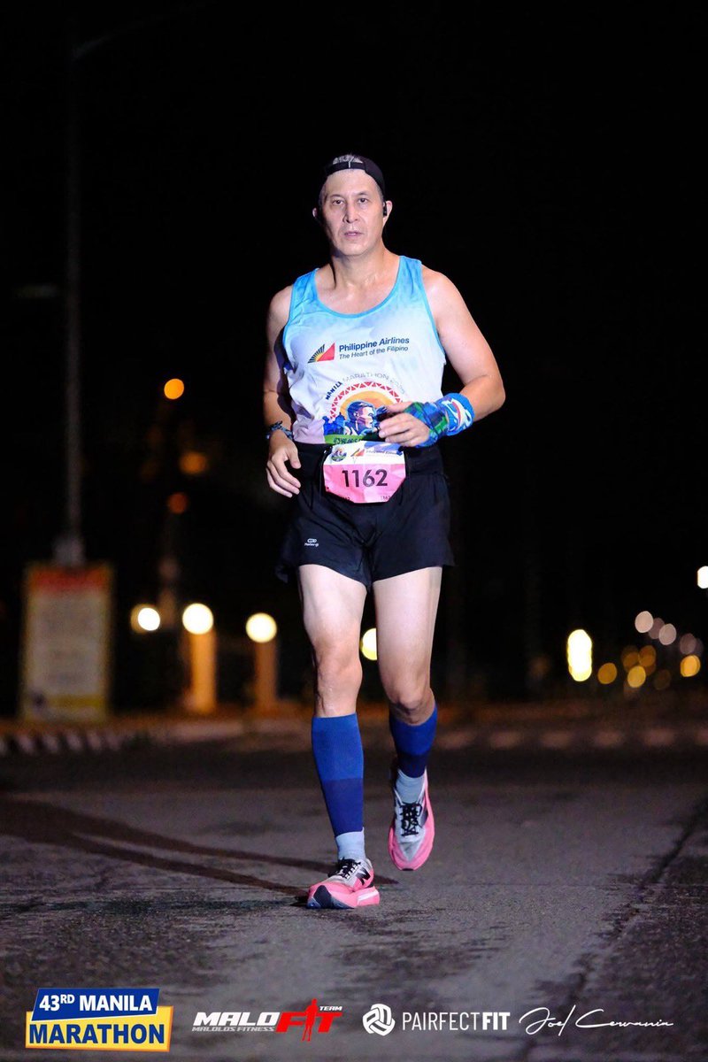 Hindi ako galit. Puyat lang. #manilamarathon #43rdpalmanilamarathon2025 #rainorshine