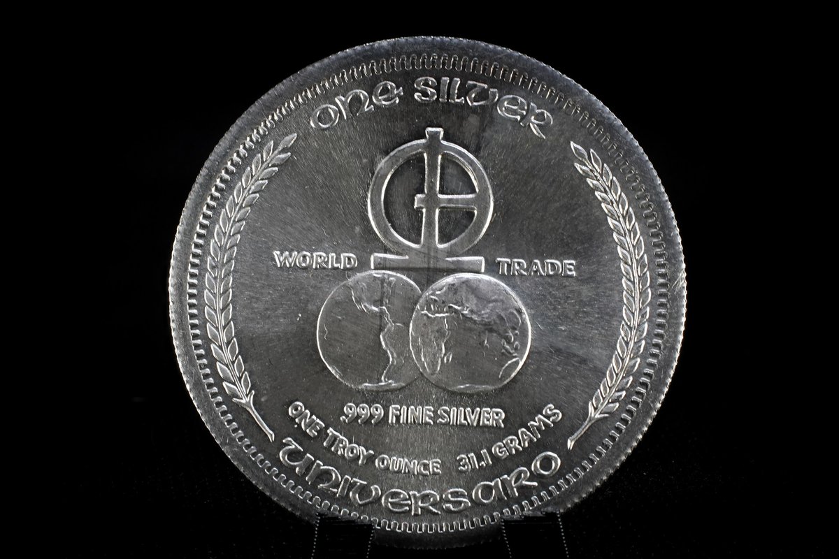 The internet tells me this is the first modern silver round with a date on it. neat!