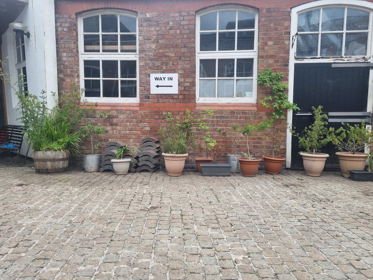 scouse_mouse_20's tweet image. Now we have secured a year (at least) at the Heritage Centre, time to bring it up to scratch. Today, four of us carried on working on the surface. The volunteers have been working on it for the past couple of weeks. Stone moving and weeding today