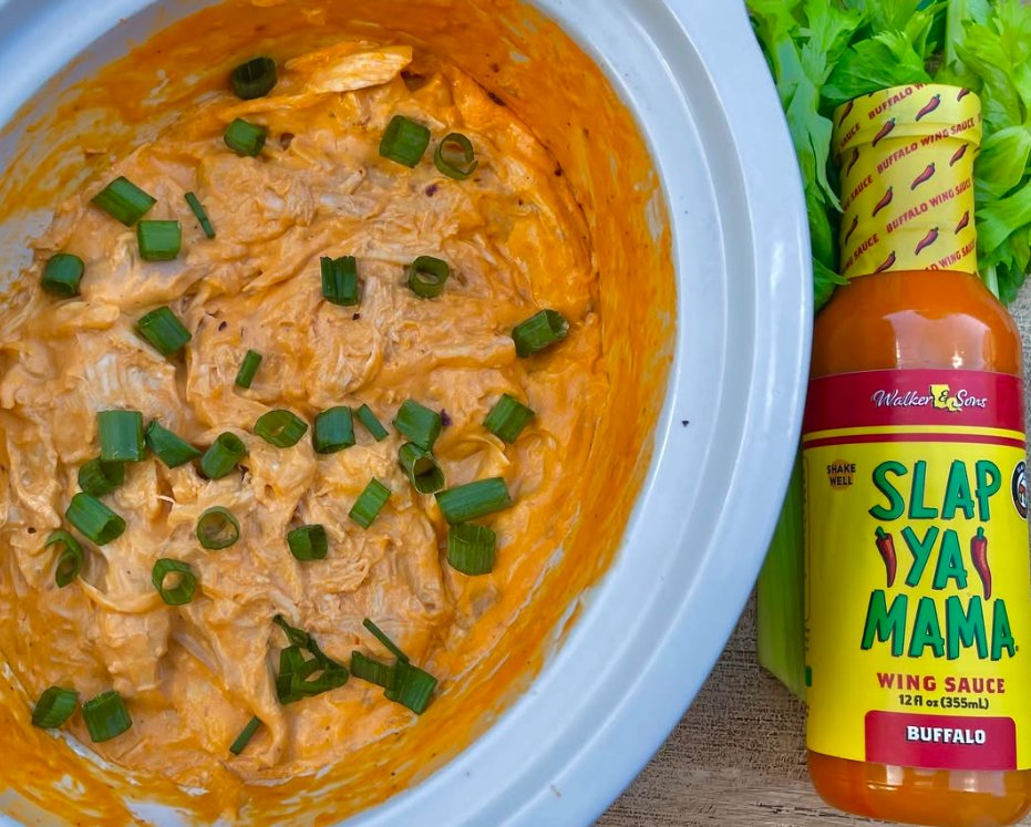 Watching baseball? Mama’s Easy Buffalo Chicken Dip is a must! 🌶️🔥 #cws2025 

🍴Recipe:
-1 Rotisserie chicken (shredded)
-1 block of cream cheese
-½ Cup Slap Ya Mama Wing Sauce
-½ Cup Ranch

Place in a crockpot and stir occasionally. Once the cheese is melted and the mixture is