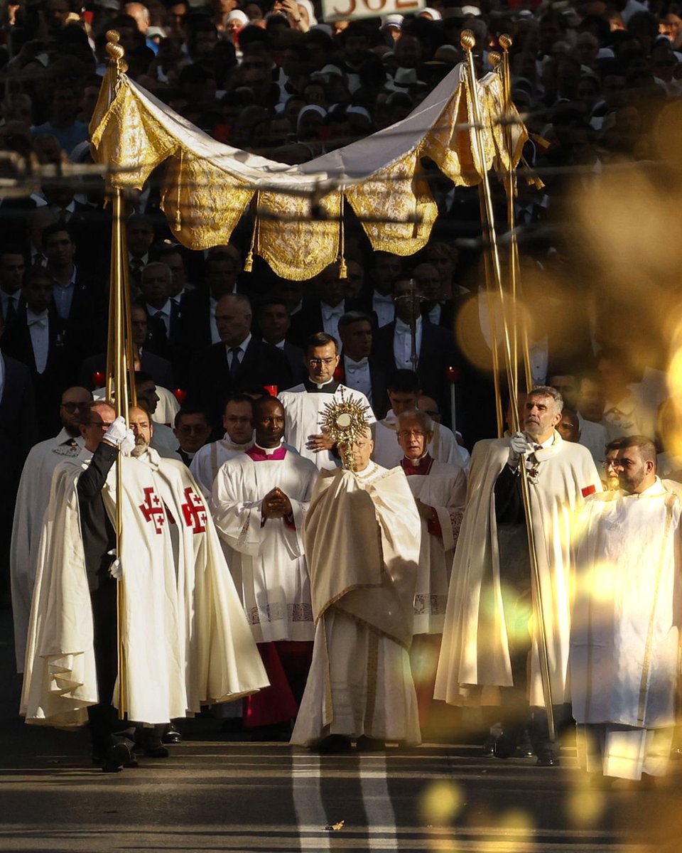 Pope Leo XIV carrying Jesus through Rome