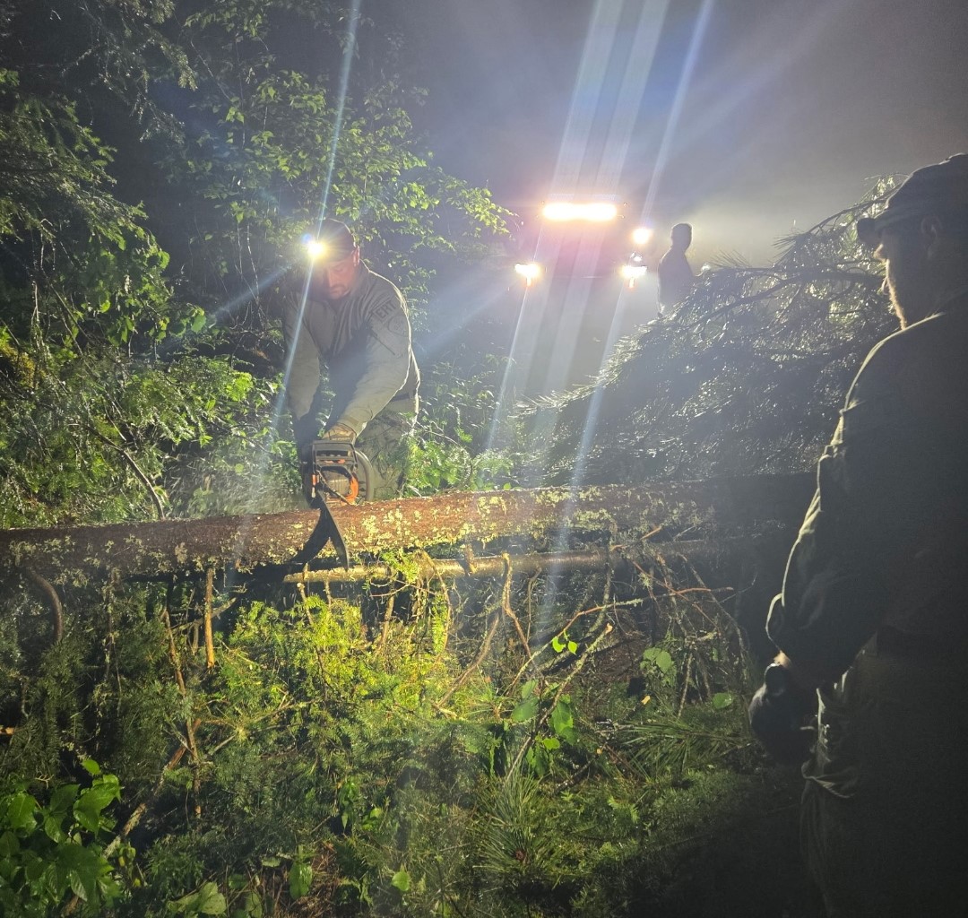 OPP_ER's tweet photo. An amazing joint-services rescue this weekend in an extremely isolated area of Algonquin Provincial Park.

A mother and young son had been camping when major thunderstorms with strong winds rolled through the area Saturday night. A tree fell on their tent and the 13-year-old was left with very serious injuries and no way to get to help.

Mom triggered an 'SOS' signal on a device which transmitted their coordinates to rescuers. Upper Ottawa Valley OPP members loaded up their ATVs and headed to the nearest park entrance to the location. The rescue team also included OPP Emergency Response Team members, Algonquin Park Rangers and the Renfrew County Paramedics' Sierra Team.

An aerial rescue wasn't possible due to the weather, so first responders had to make a harrowing trek through roads and trails filled with downed trees and other debris and through dense brush. They used hand saws to clear the way until chainsaws could arrive.

Rescuers then launched a canoe and paddled to the stranded mother and her seriously injured son and began immediate first aid.

By 8:30 Sunday morning, a Ministry of Natural Resources float plane was able to land on the nearby lake and transport mother and son to hospital, where the young man underwent treatment for his injuries.

In addition to those on the ground, the rescue effort also included the MNR aviation team, OPP Communication Centres and Provincial Operations Centre, the Algonquin Park Duty Officer and the Joint Rescue Coordination Centre. A special thanks to the Deep River Fire Department for providing the much-needed chain saws. 

The seamless teamwork of this successful rescue is an example of the resilience and training of all involved.  @JRCCTrentCCCOS @RenCtyParamedic ^bd