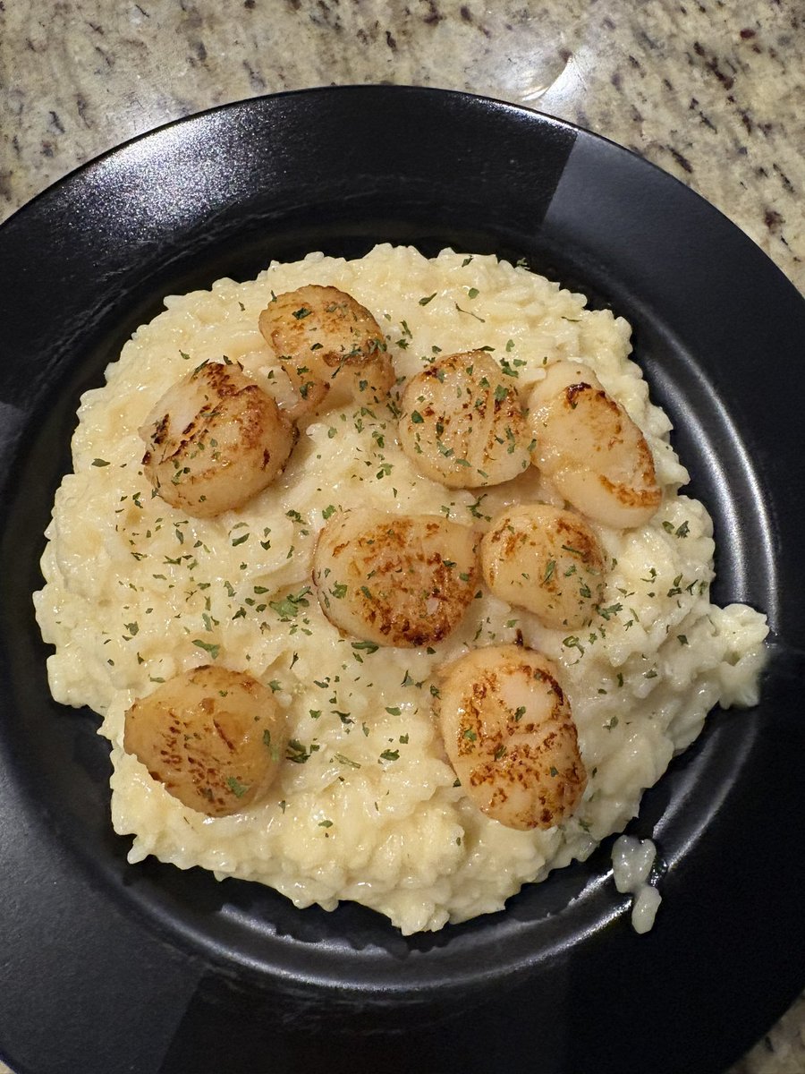 I like to cook a lot of things but I think brown butter scallops over parmasean risotto might be the most satisfying to cook
and eat.