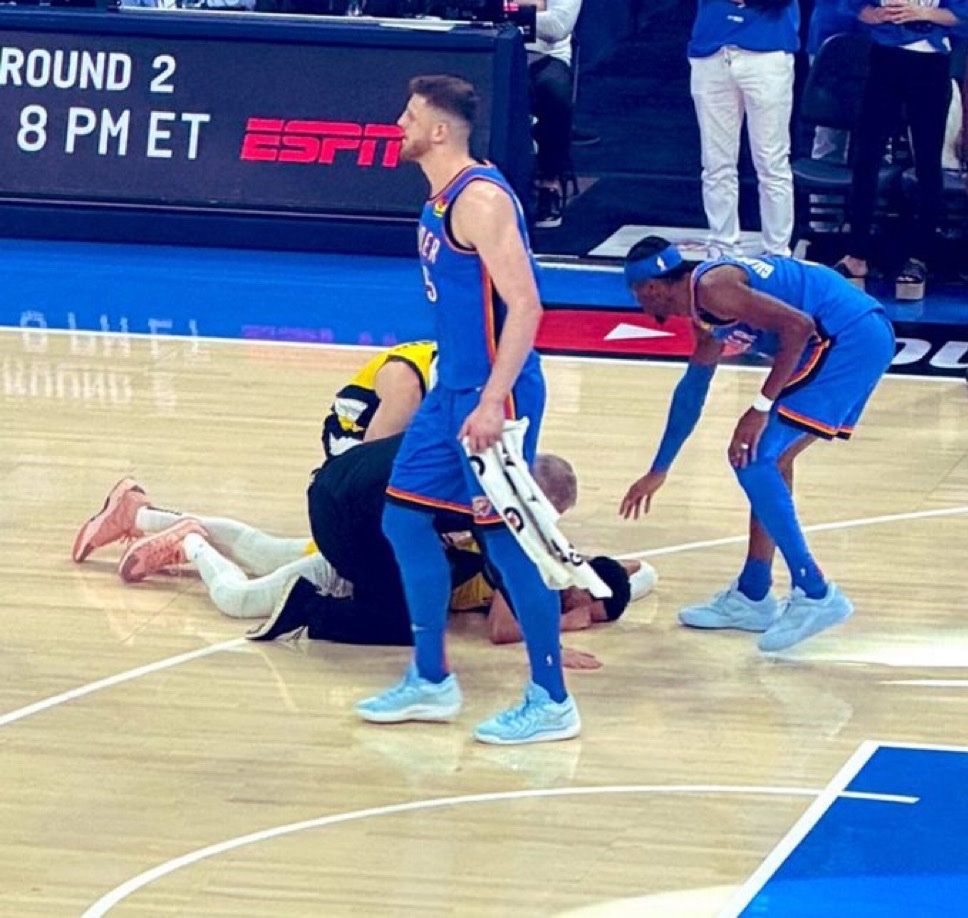 Deadspin's tweet image. SGA consoling Haliburton after rupturing his Achilles.

Bigger than sports.