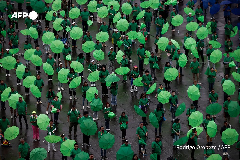 AFP’s Rodrigo Oropeza photographs people taking part in the formation of the world's biggest LGBT pride flag at Zocalo Square in Mexico City