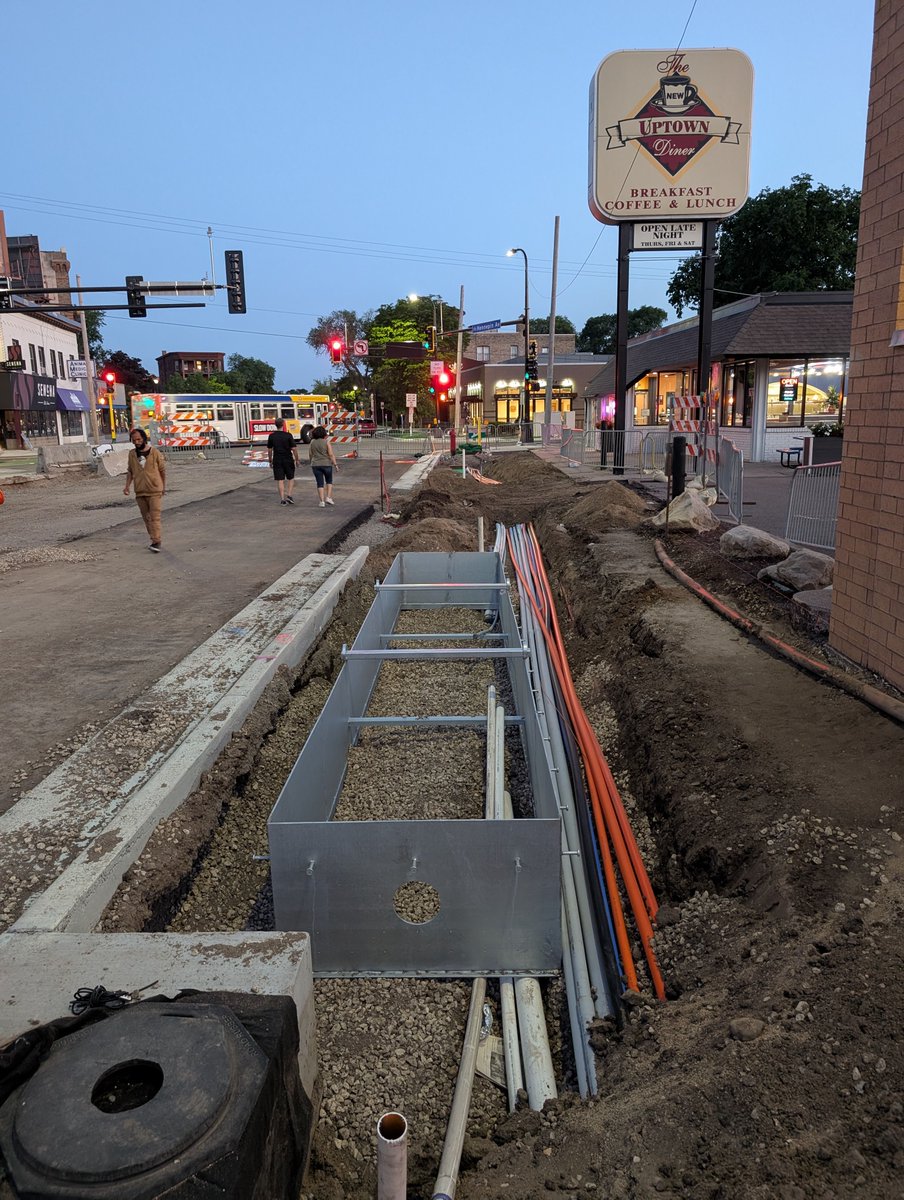 Hennepin at 25½ St. Progress towards new sidewalks. Getting closer to the day when Hennepin Ave haters will get quiet and not want to talk about it anymore because it's so obviously better, safer, &amp; more pleasant than what was there before.