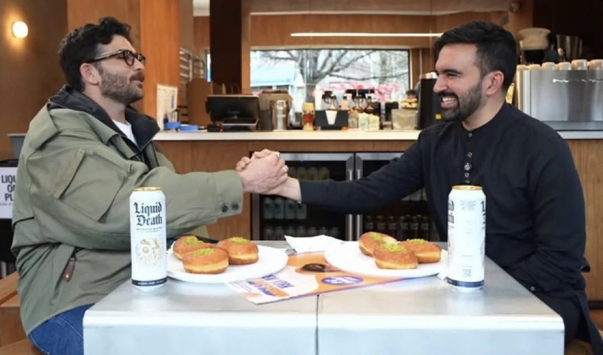 Dexertonox's tweet image. Resurfaced photo shows NYC mayoral candidate Zohran Mamdani "dapping up" leftist streamer Hasan Piker, who once said the existence of baby cars in Disney Pixar's 'Cars' universe implies the female cars have a "cussy" or "car pussy"