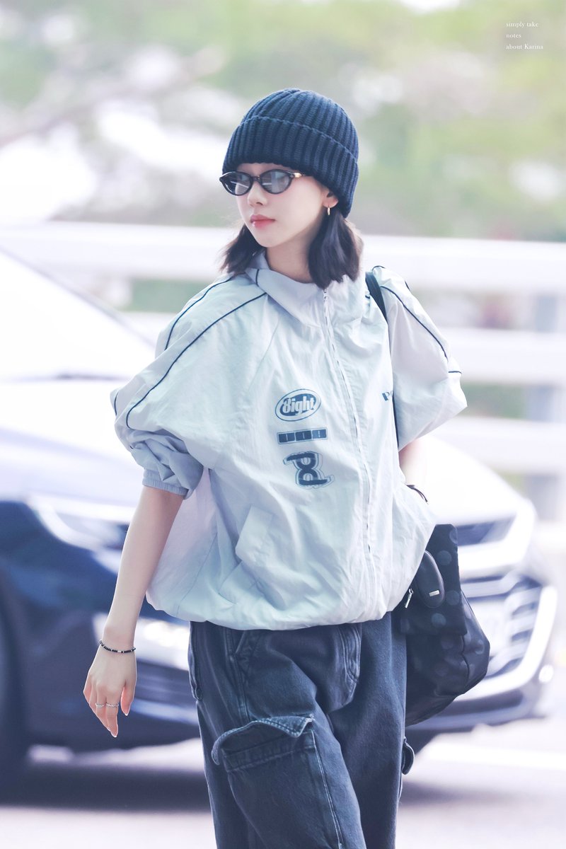 KARINA was seen wearing Gentle Monster takion T1 glasses & tank