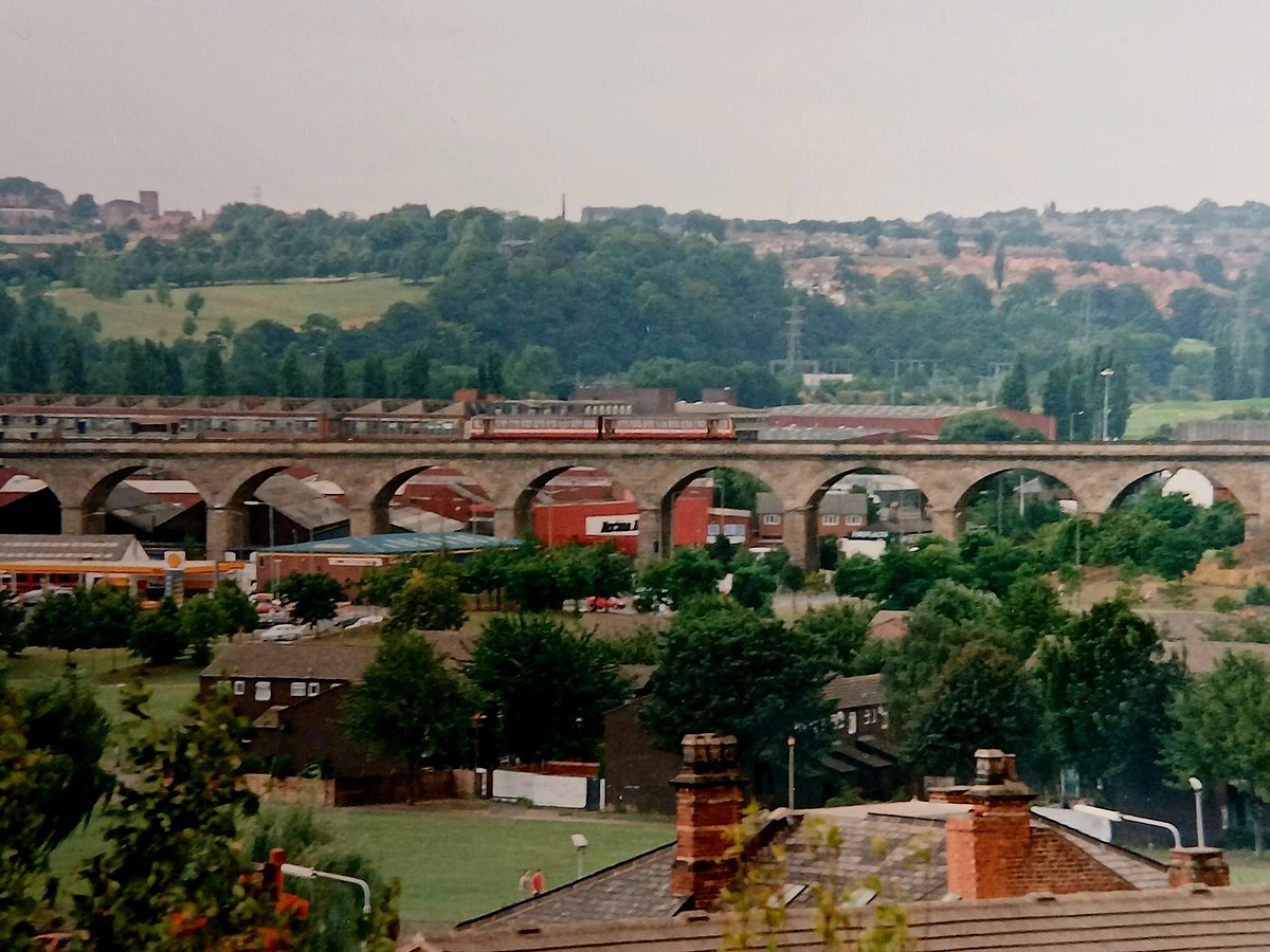 Invermuir's tweet image. Couple of pacers bouncing around on the Kirkstall viaduct Leeds 30 years ago. #tmrguk #DMUs