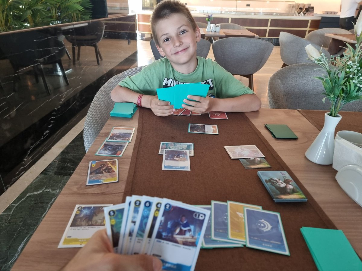PavelKolev7's tweet image. Didn't have time to print @playriftbound proxies before our family holiday but the little one is so hooked he made me take the Chinese cards so we can play, and here we are...