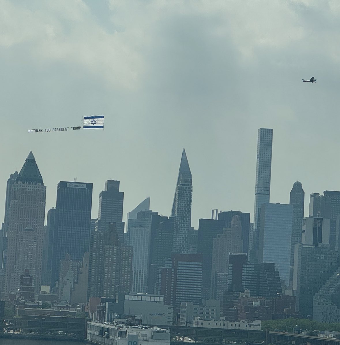 Live scene from New York City. 

Plane flies overhead with banner that reads “Thank you President Trump” accompanied by an Israeli flag.