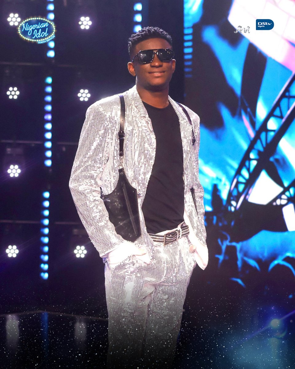 Nigerianidol's tweet photo. Lawrence said this is not cosplay, it is canon: a little rock growl, a little pop polish and MJ-level conviction. 🪩

He did not just sing Michael Jackson's 'Black or White', he meant it. Watch him tear it up: https://t.co/cCJfQqaWv9

#NigerianIdol https://t.co/McJh3b5phR