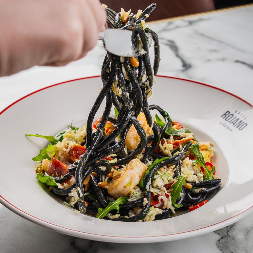White Crab &amp; King Prawn | Black Bucatini Pasta

Confit tomatoes, garlic, chilli, toasted pine nuts, basil, parsley, rocket, finished with Omed Picual extra virgin olive oil - light, fresh, and made for long sunny days.