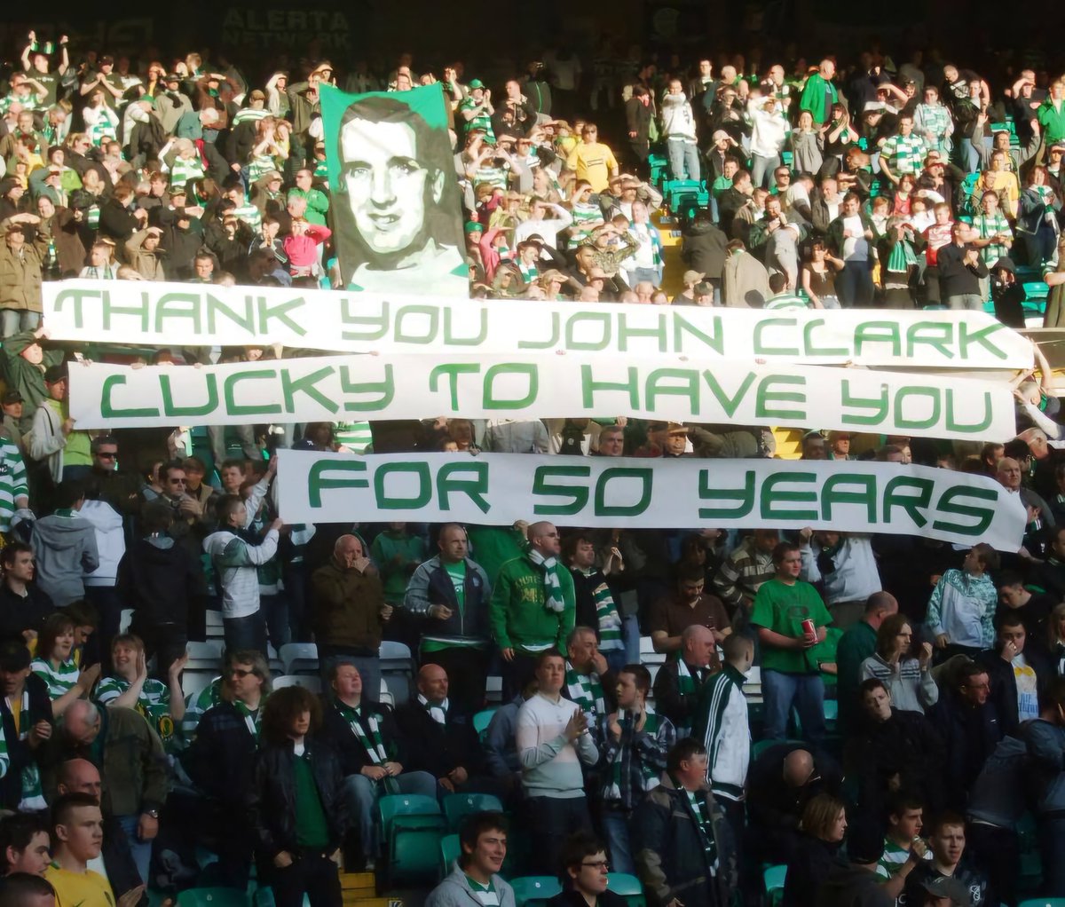 NCCeltic's tweet image. John Clark was a Celtic giant; but he carried himself as a humble, ordinary fan.
In 2009, the Green Brigade paid a small tribute to John Clark.
To their surprise and honour, the great man invited them to Celtic Park to personally thank them.
Rest in peace, John.
