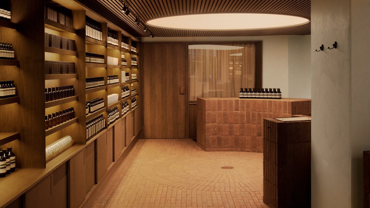Loving the cinematic lighting and rich tones of the Aēsop signature store in Copenhagen, Denmark