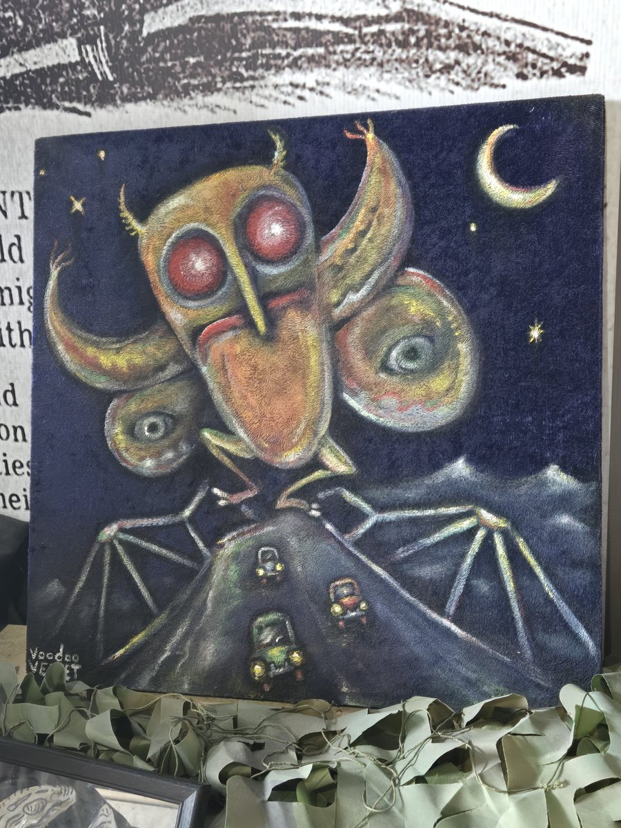 HarrySFX's tweet image. Saw this at The Mothman museum and quickly wondered if it was done by @VoodooVelvet - looked down at the corner and sure enough, there it was. Wonderful work!