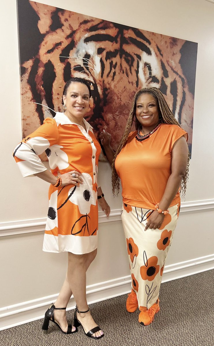 Twinning with my friend and colleague <a href="/YvonneMThornton/">YThornton</a> at work today. I said: "We look like a singing group". We're going to call ourselves "Destiny's Tiger". 🐅🤣🤣🖤🧡