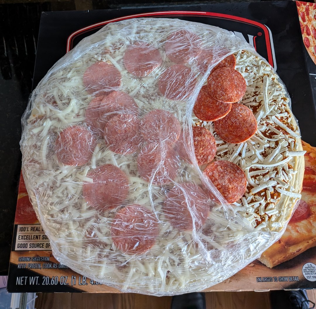 walkertherunner's tweet photo. Hey @redbaronpizza Have any recommendations of what I should do when I open a box of your pizza and the plastic wrap isn't fully surrounding your pizza? If it's even safe to eat I'm sure the quality has gone down and is freezer burnt. https://t.co/A9IKHi0Ws9