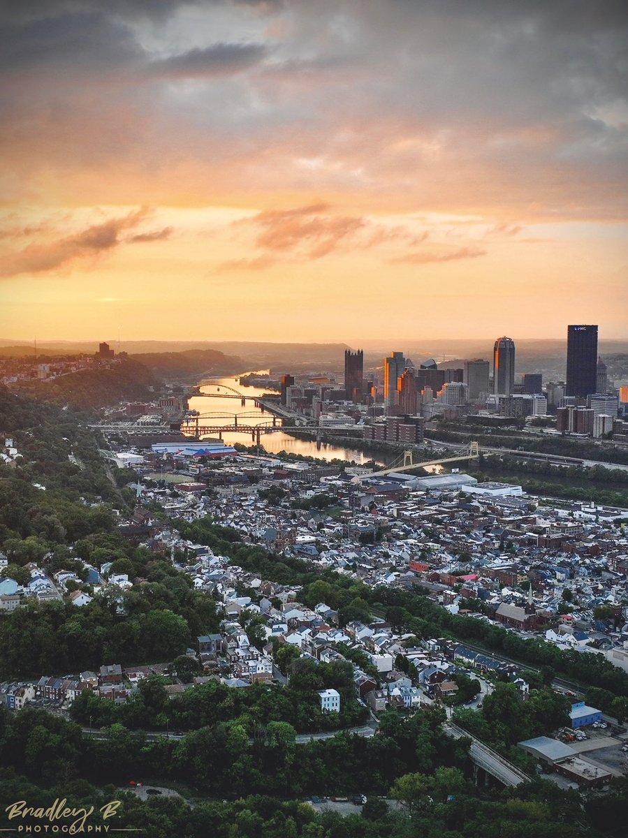 Pittsburgh skyline, Monongahela River, and Southside Slopes/Flats at sunset.