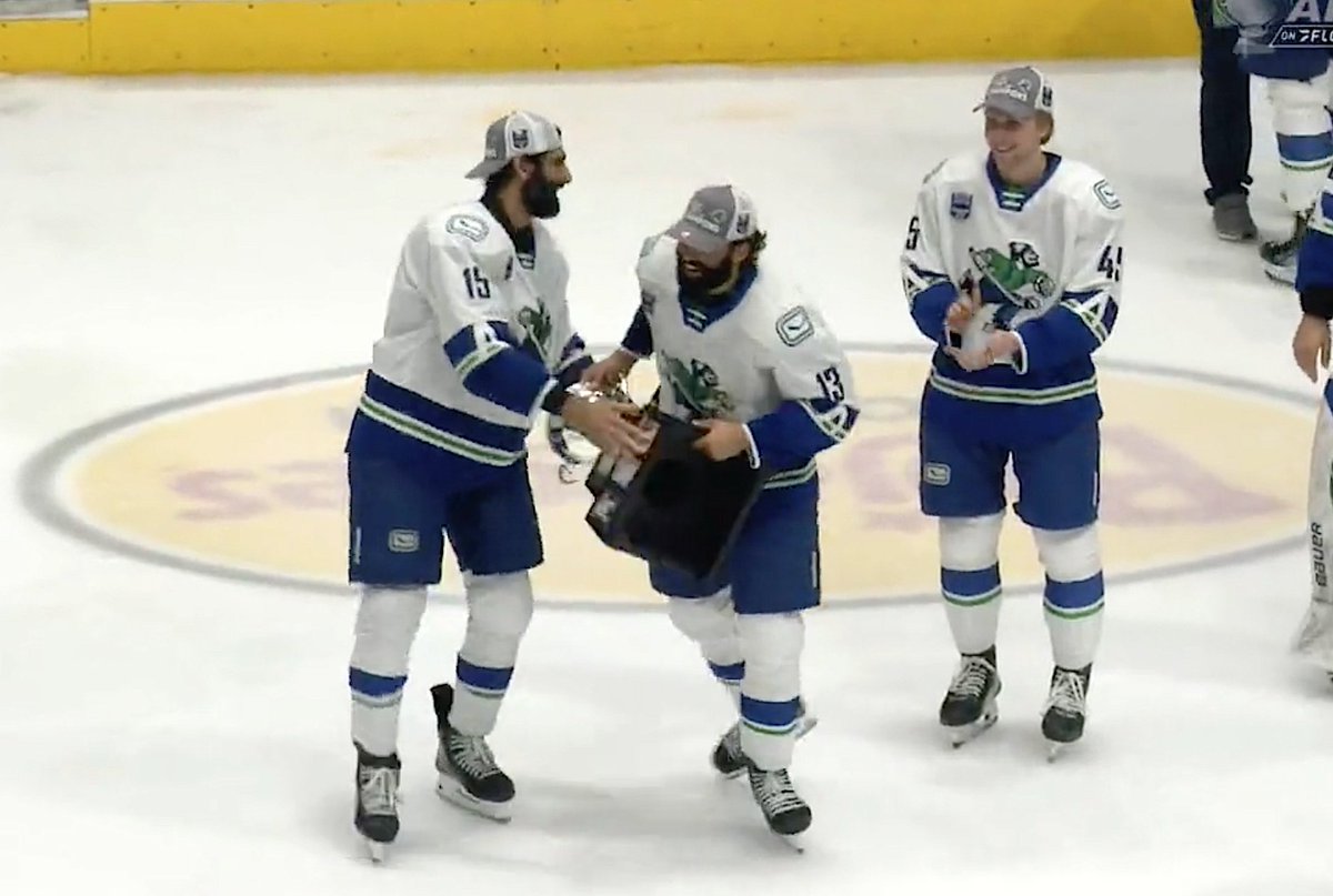 Surrey guys celebrate the <a href="/abbycanucks/">Abbotsford Canucks</a> championship! 
Jujhar Khaira passes the Calder Cup to teammate Arshdeep Bains. #Canucks