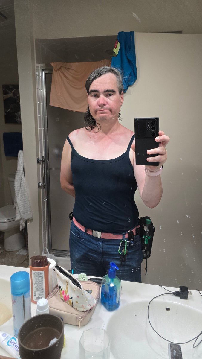 Whos bright idea was it to do a 3 mile round trip walk to a grocery store for a single item??... (it was me, I needed a gallon of water) that top was soaked when I got back. 

No ragrets.