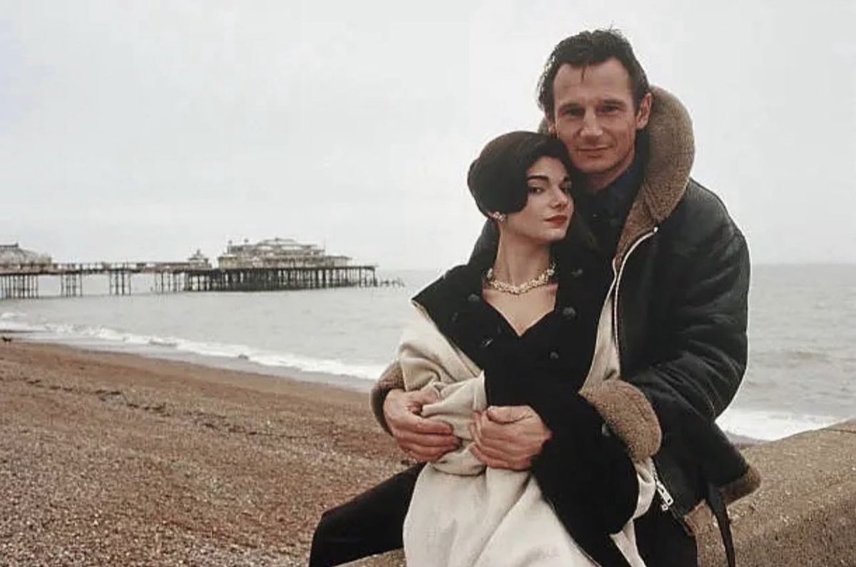 Liam Neeson and Laura San Giacomo on Brighton Beach, 1991.

Laura San Giacomo and Liam Neeson starred together in the 1991 thriller Under Suspicion, which was partially filmed in Brighton, UK. The movie is set in 1950s Brighton, and features Liam Neeson as a private investigator