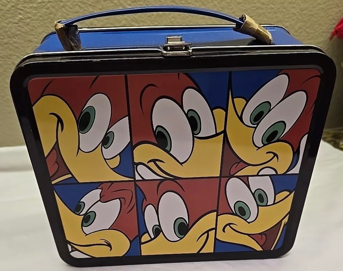 Assorted faces of Woody Woodpecker. - Lunchbox (1997).
