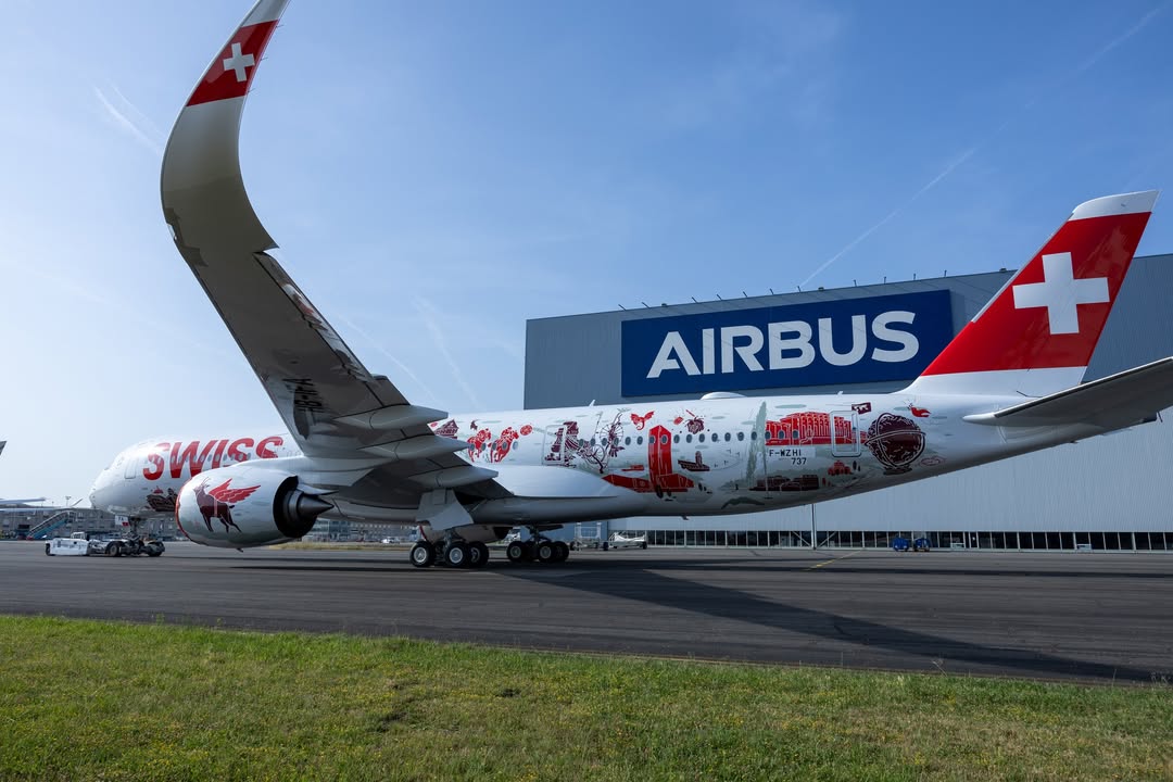 airwaysmagazine's tweet photo. 🔴 Airbus has rolled out SWISS’s first Airbus A350-900, featuring the Wanderlust special livery. It has just emerged from the hangar in Toulouse. #Airbus #avgeek https://t.co/Wk8bPV9OSe