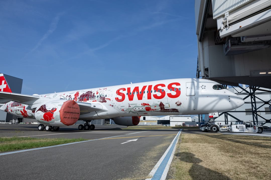 airwaysmagazine's tweet photo. 🔴 Airbus has rolled out SWISS’s first Airbus A350-900, featuring the Wanderlust special livery. It has just emerged from the hangar in Toulouse. #Airbus #avgeek https://t.co/Wk8bPV9OSe