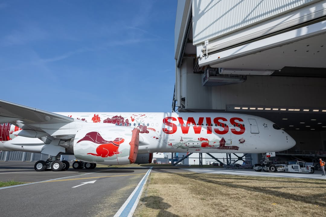 airwaysmagazine's tweet photo. 🔴 Airbus has rolled out SWISS’s first Airbus A350-900, featuring the Wanderlust special livery. It has just emerged from the hangar in Toulouse. #Airbus #avgeek https://t.co/Wk8bPV9OSe