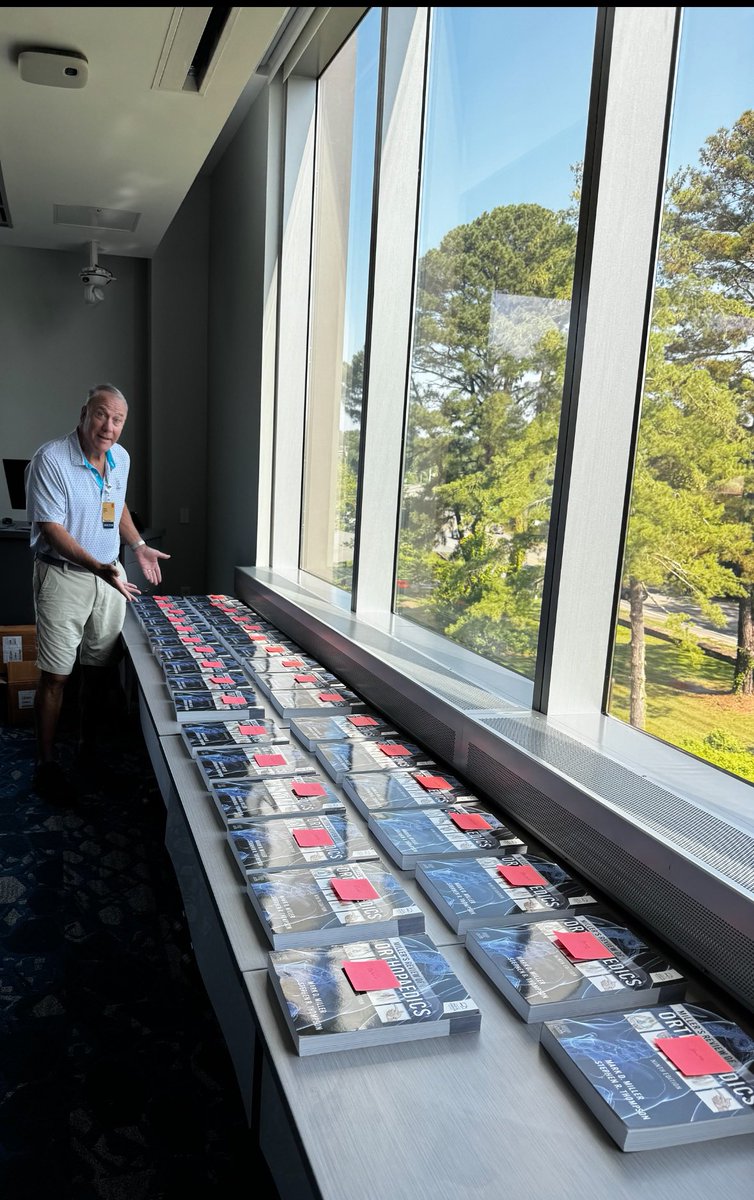 Dr. Mark Miller celebration of his ninth and final edition of the Miller Review Book!  Over 70 total Ortho books published!  Personalized book gifted to every resident at UVA Ortho.